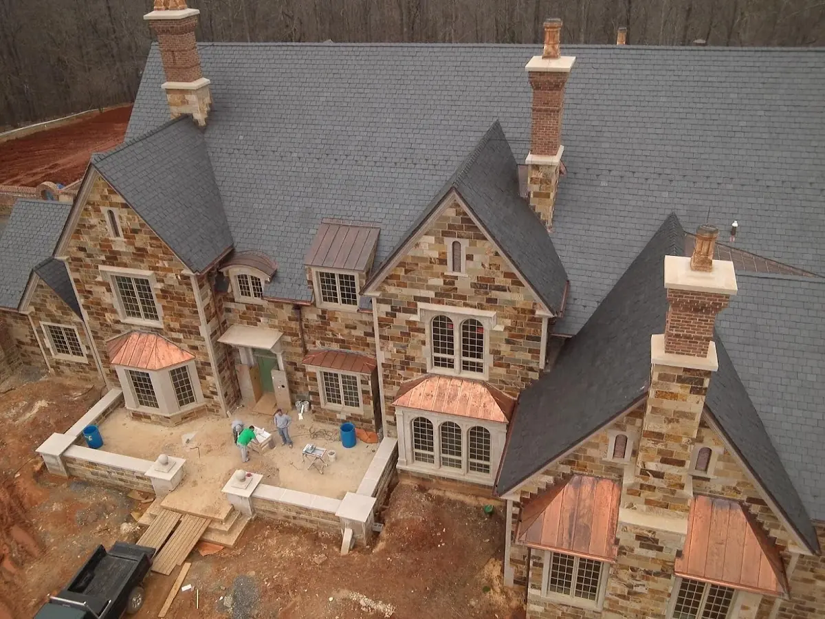 Craftsman Roofing Slate Roof Repair project in Industry